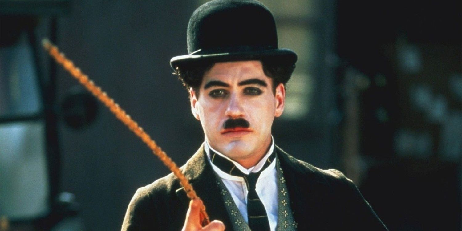 Robert Downey Jr as Charlie Chaplin in his little tramp costume in Chaplin