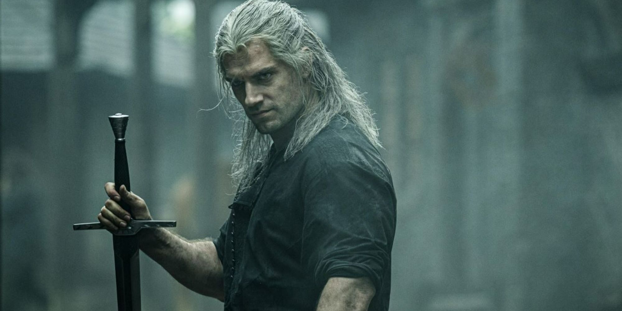 Gambar ikonik Geralt of Rivia memegang pedang di The Witcher